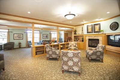 Cozy common area with seating and a fireplace
