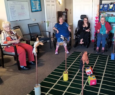 Residents engaged in an activity in a communal space