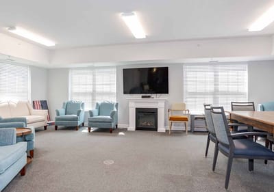 Common area with seating and a fireplace