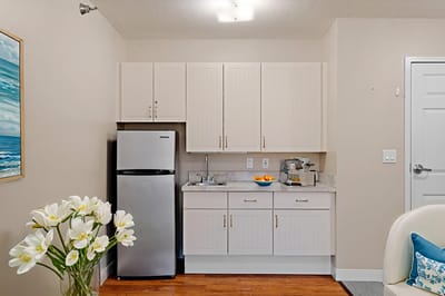Interior kitchenette area with modern appliances