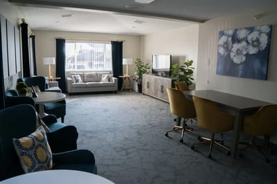 Bright common area with seating and decor