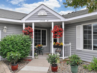 Exterior view of the facility entrance with flowers