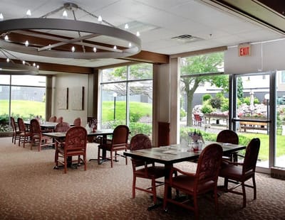 Dining area with table and outdoor view