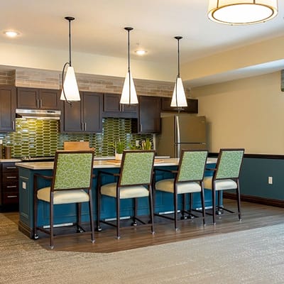 Bright, modern kitchen area with seating
