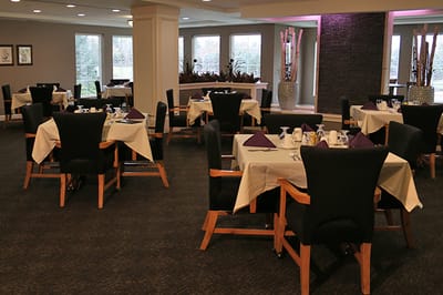 Elegant dining room with beautifully set tables