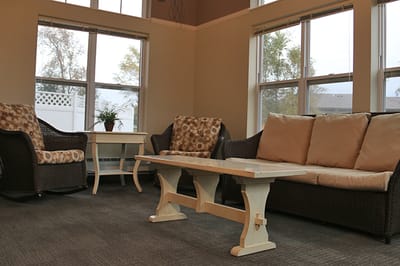 A common area with seating and natural light