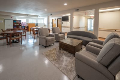 Cozy common area with seating and tables