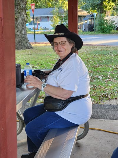 Resident enjoying time at an outdoor table