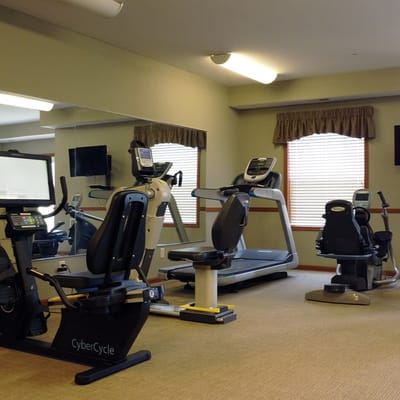 Interior view of a fitness room with exercise equipment