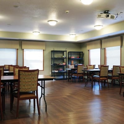 Bright common area with tables and chairs
