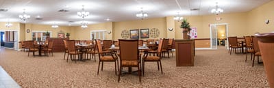 Interior view of a dining room with empty tables