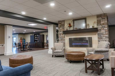 Cozy common area with seating and a fireplace