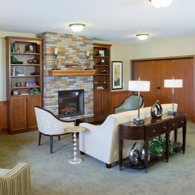 Cozy common area with seating and a fireplace