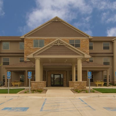 Exterior view of All Saints Senior Living facility