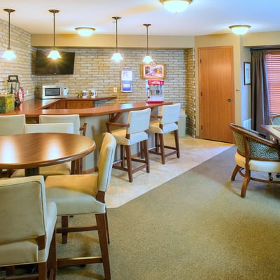 Interior of a common area with seating and bar