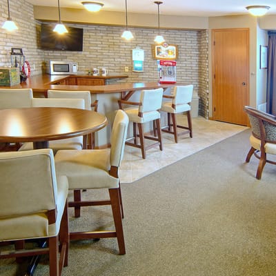 Bright common area with tables and seating