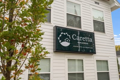 Caretta Maplewood facility sign on a building exterior