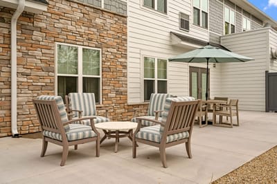 Outdoor seating area with chairs and table