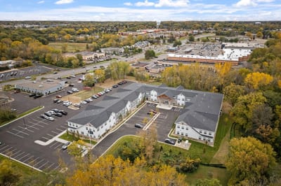 Aerial view of Caretta Senior Living Maplewoo facility with parking