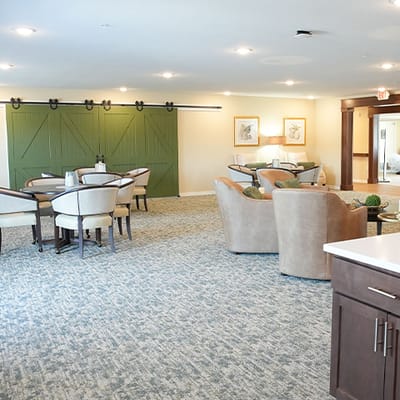 Common area with seating and green decor