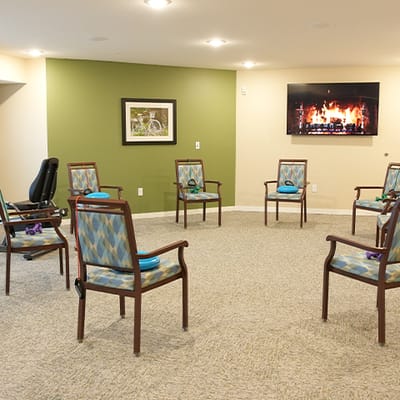 Activity room setup with chairs and television