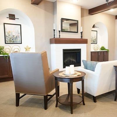 Cozy common area with seating and fireplace