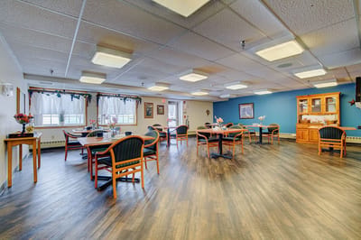 Interior common area with tables and chairs