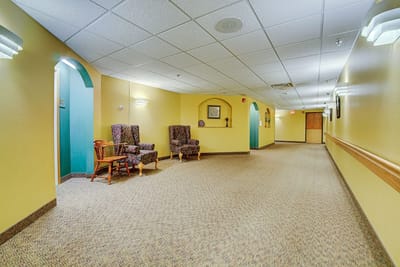 Interior hallway with seating and bright colors