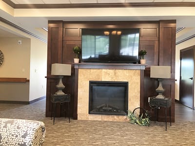 Interior common area with fireplace and seating