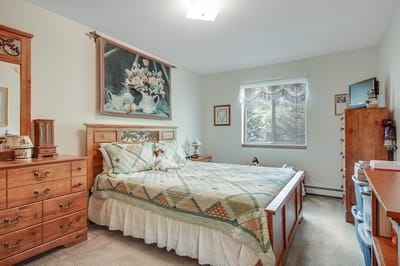 Cozy resident room with a bed and decorative elements