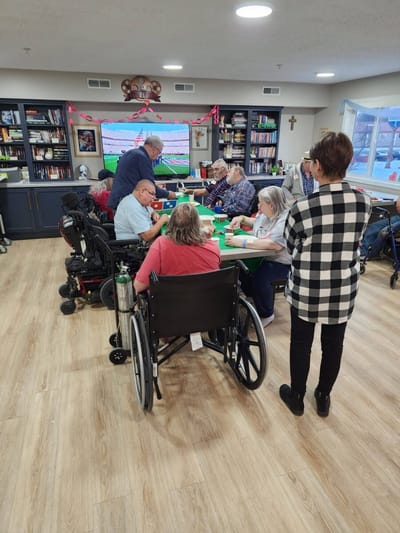 Residents engaged in an art activity at a common area