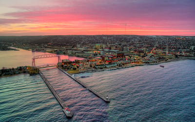 Aerial view of a city at sunset