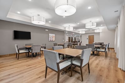 Dining area with modern furniture and lighting