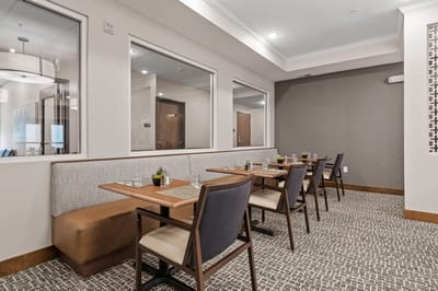 Interior dining area with tables and chairs