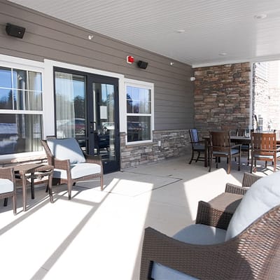 Outdoor seating area with chairs.