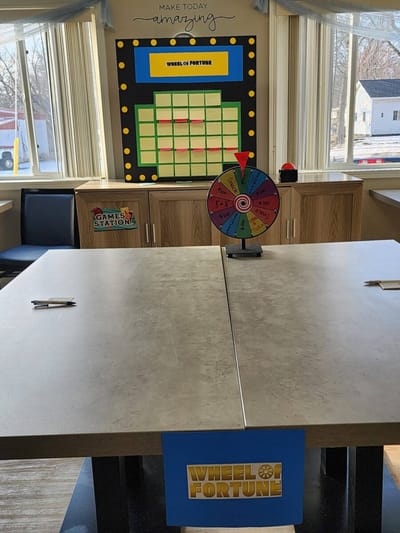 Interior game area with a Wheel of Fortune setup