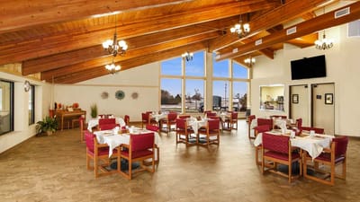 Dining room with tables set for meals