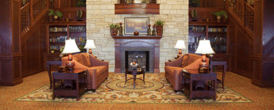 Cozy common area with seating and a fireplace