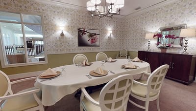 Elegant dining room setup with floral decorations