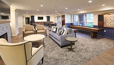Common area with seating and a fireplace