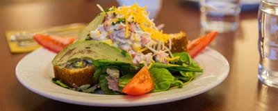 A colorful salad served on a dining table