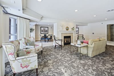Cozy common area with seating and a fireplace