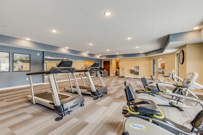 Interior view of a fitness area with exercise equipment