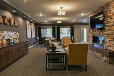 Interior common area with seating and fireplace