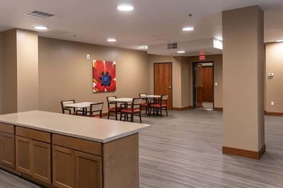 Interior common area with tables and chairs
