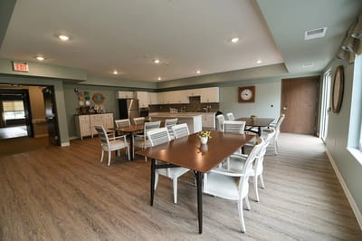 Bright dining area with tables and chairs