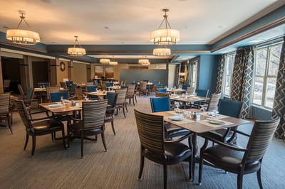 Dining room with set tables and chairs
