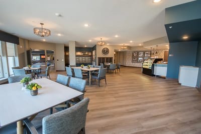 Bright common area with seating and decor
