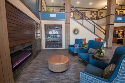 Cozy common area with comfortable seating and a fireplace