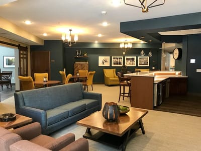 Bright common area with seating and decor
